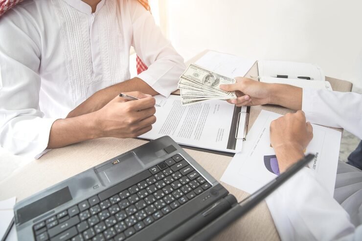 cropped-hands-businessman-bribing-male-colleague-office_1048944-10470735
